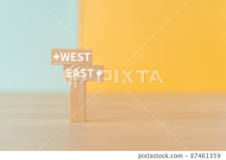 Image of East and West | Building blocks with "WEST" and "EAST" written on them 87461359