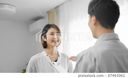 Men in work clothes explaining to the landlord Safety inspection image 87463062