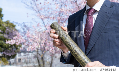 Graduation ceremony / diploma image | Men in suits 87463448