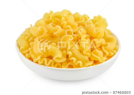 Pasta cornetti creste macaroni in bowl isolated on white background with clipping path and full depth of field 87468803