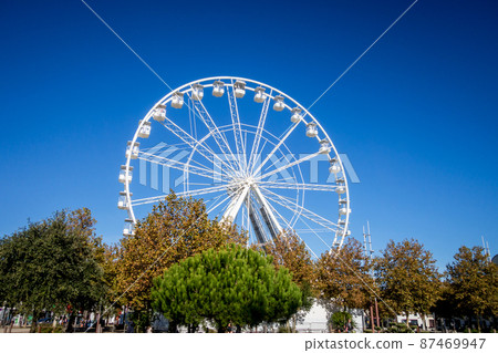 Ferris wheel in La Rochelle harbor, France 87469947