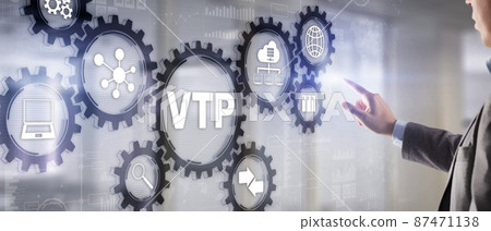 The man clicks on the inscription VTP. VLAN Trunking Protocol. Virtual Local Area Network 87471138
