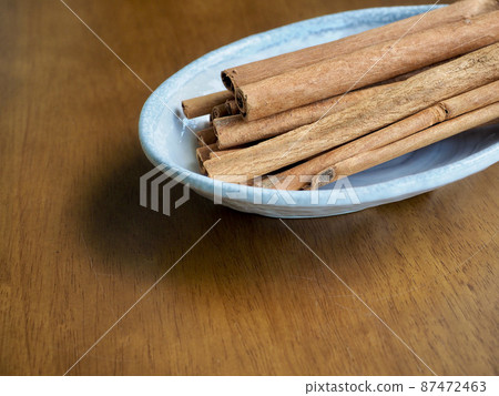Dried spice cinnamon, cooking ingredients Dried spice cinnamon, cooking ingredients 87472463