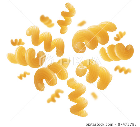 Italian pasta in the shape of a heart on a white background Italian pasta in the shape of a heart on a white background 87473785