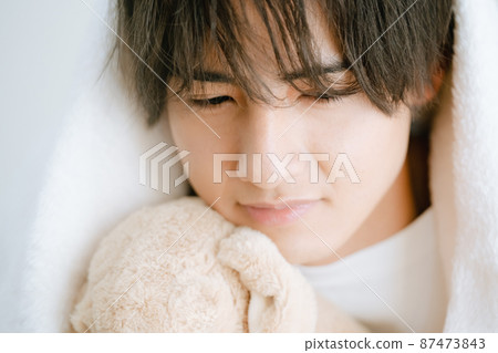 Plush toys and young men Plush toys and young men 87473843