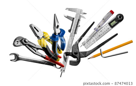 Construction tools levitate on a white background 87474013