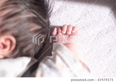 1 month old hand 1 month old hand 87474573