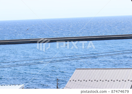 Spring sea seen from the port town 87474679