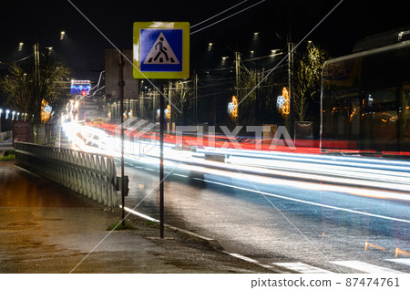 Traffic at night, traffic on city roads at night. Traffic at night, traffic on city roads at night. 87474761