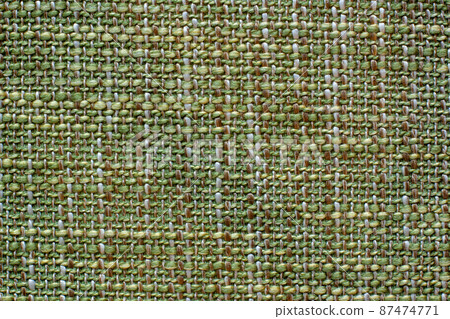 Color fabric texture. Woolen soft crumpled fabric of a green shade. Copy space. Color fabric texture. Woolen soft crumpled fabric of a green shade. Copy space. 87474771
