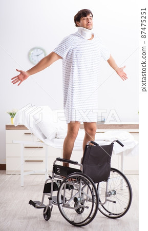 The young handsome man in wheelchair at the hospital The young handsome man in wheelchair at the hospital 87475251