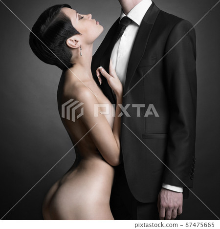 Portrait of young elegant couple. Sexy beautiful lovers 87475665