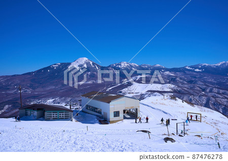 View Kurumayama Observatory Lift Sancho Station and Northern Yatsugatake from the summit of Kurumayama in Nagano Prefecture in winter 87476278