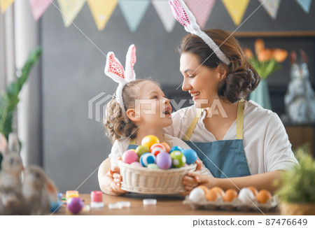 family preparing for Easter family preparing for Easter 87476649