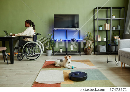 Black Woman in Wheelchair in Smart Home 87478271