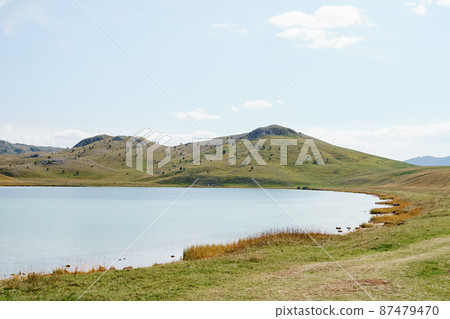 Mirror surface of Lake Vrazje. Montenegro Mirror surface of Lake Vrazje. Montenegro 87479470