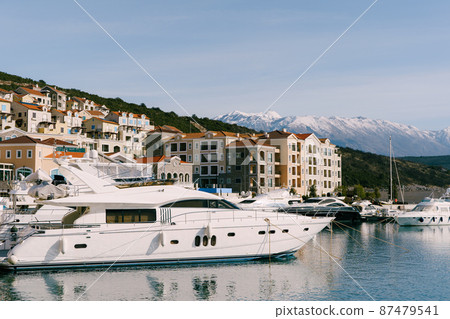 Luxurious white yacht at the pier. Lustica Bay, Montenegro 87479541