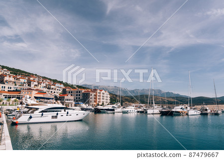 Luxurious yachts at the dock of Lustica Bay. Montenegro 87479667