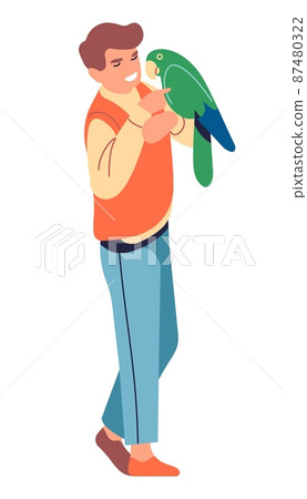 Man holding big green parrot. Guy talking with bird 87480322