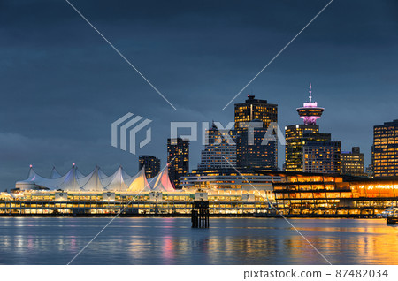 Modern buildings illumination with central market on coastline at Stanley park, Vancouver 87482034