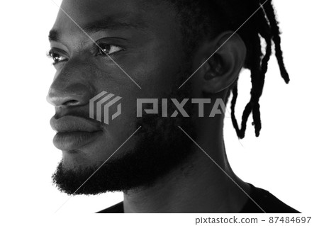 A black and white portrait of a young man. A black and white portrait of a young man. 87484697