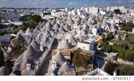 Famous Trulli houses in the city of Alberobello in Italy 87487617