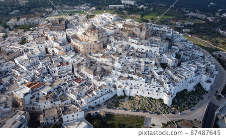 Ostuni - the white city in Italy - a famous landmark at the Italian east coast 87487645