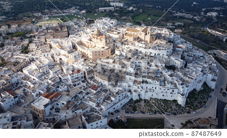 Ostuni - the white city in Italy - a famous landmark at the Italian east coast Ostuni - the white city in Italy - a famous landmark at the Italian east coast 87487649