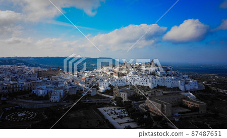Ostuni - the white city in Italy - a famous landmark at the Italian east coast 87487651