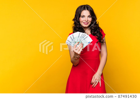 Woman showing fan euro 87491430