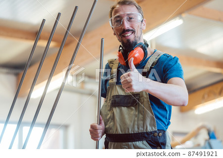 Stairway maker in his workshop Stairway maker in his workshop 87491921