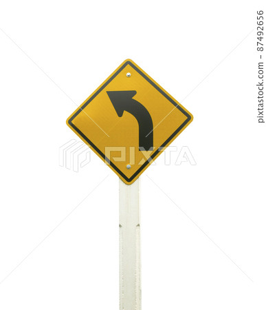 warning sign on the left curve means the way ahead is a left curve. warning sign on the left curve means the way ahead is a left curve. 87492656