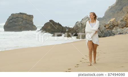 A relaxing day on a sandy beach at the ocean A relaxing day on a sandy beach at the ocean 87494090