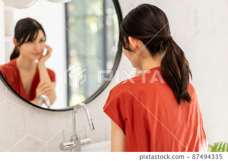Bathroom and women Bathroom and women 87494335