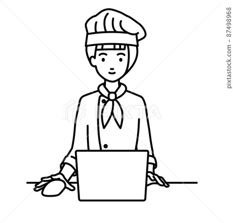 一位坐在辦公桌前使用 PC 的女廚師 一位坐在辦公桌前使用 PC 的女廚師 87498968