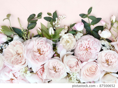 Delicate blooming festive roses and light pink flowers background, blossoming rose flower soft pastel frame, bouquet floral card, selective focus Delicate blooming festive roses and light pink flowers background, blossoming rose flower soft pastel frame, bouquet floral card, selective focus 87500652