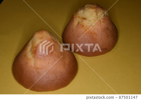 Two sweets with a yellow background Two sweets with a yellow background 87501147