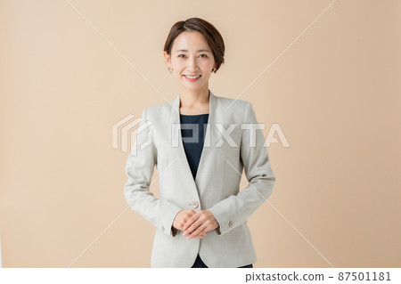 Business woman portrait beige 87501181