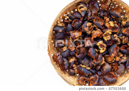 Dried mangosteen peel on white background. 87501688