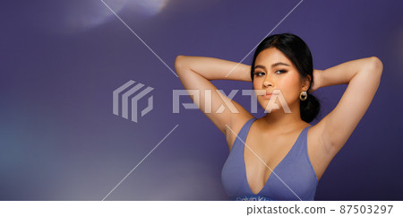 Asian 20s Woman chubby wear sport bra in purple color Very Peri world trend over purple background 87503297