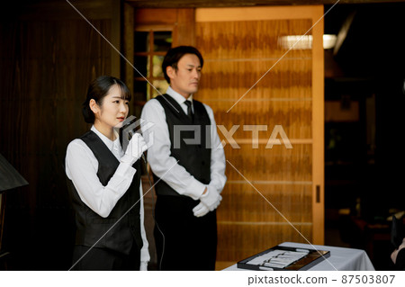 Funeral director (moderator) who accepts at the funeral Funeral director (moderator) who accepts at the funeral 87503807