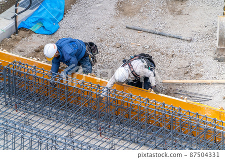 Reinforcing bar construction, reinforcement reinforcement, foundation work, construction site Reinforcing bar construction, reinforcement reinforcement, foundation work, construction site 87504331