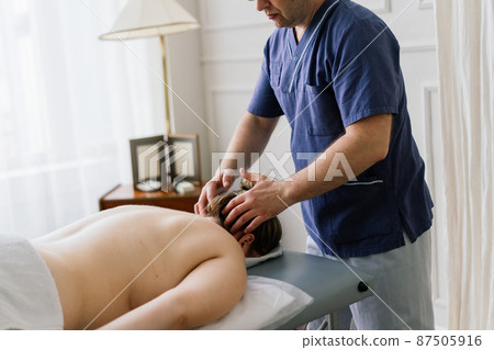 Anti-cellulite foot massage for a fat woman. Concept of personal care, weight loss, diet. Close-up. Anti-cellulite foot massage for a fat woman. Concept of personal care, weight loss, diet. Close-up. 87505916