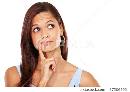 Shes simply gorgeous. Studio shot of an attractive young woman isolated on white. Shes simply gorgeous. Studio shot of an attractive young woman isolated on white. 87506293