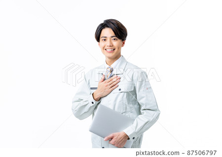 White background young male technician 87506797