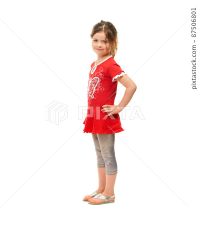 Cute and sassy. Cute little girl standing against a white background. Cute and sassy. Cute little girl standing against a white background. 87506801