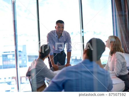 Do you know how big this deal is. Shot of group of colleagues having a meeting in the boardroom at the office. Do you know how big this deal is. Shot of group of colleagues having a meeting in the boardroom at the office. 87507592
