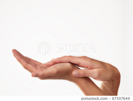 Beauty from fingertip to fingertip. Closeup studio shot of a womans hands. Beauty from fingertip to fingertip. Closeup studio shot of a womans hands. 87507649