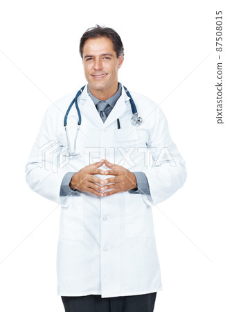 Confident middle aged doctor standing isolated on white. Portrait of a confident middle aged doctor standing isolated on white background. Confident middle aged doctor standing isolated on white. Portrait of a confident middle aged doctor standing isolated on white background. 87508015