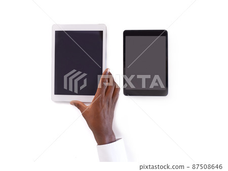 Tools of the trade. Cropped shot of a hand holding a digital tablet. 87508646